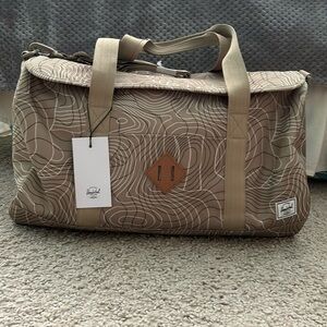 NWT Herschel Heritage Duffle in green twill topography 40L